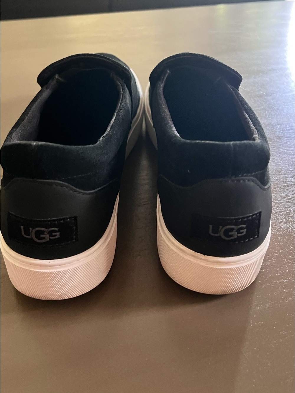 UGG Kids Black Slip-On Sneakers with White Soles